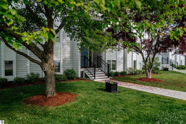 750 Centre Pl Unit 5, Traverse City, MI 49686 - view of front of house featuring a front yard
