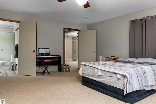 bedroom with carpet floors and a ceiling fan