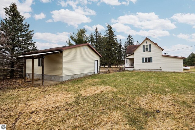 exterior space with a carport