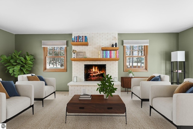800 Evart St, Cadillac, MI 49601 - carpeted living area with a brick fireplace and a wealth of natural light