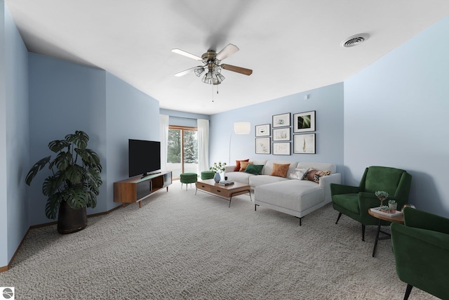 800 Evart St, Cadillac, MI 49601 - carpeted living room featuring a ceiling fan and visible vents