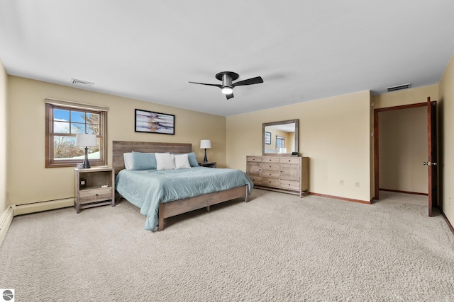 800 Evart St, Cadillac, MI 49601 - bedroom featuring baseboards, a ceiling fan, carpet flooring, and visible vents