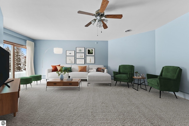 800 Evart St, Cadillac, MI 49601 - carpeted living area featuring ceiling fan and visible vents