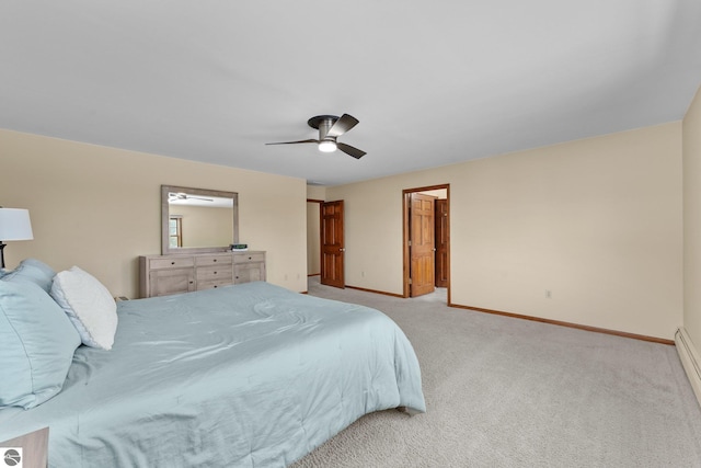800 Evart St, Cadillac, MI 49601 - carpeted bedroom with a ceiling fan and baseboards