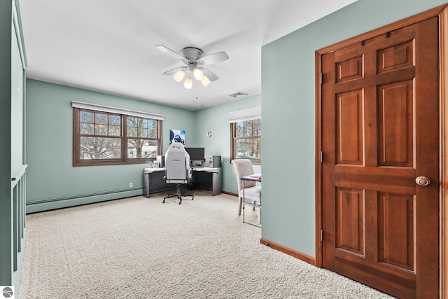 800 Evart St, Cadillac, MI 49601 - office with carpet flooring, visible vents, a ceiling fan, baseboards, and a baseboard heating unit
