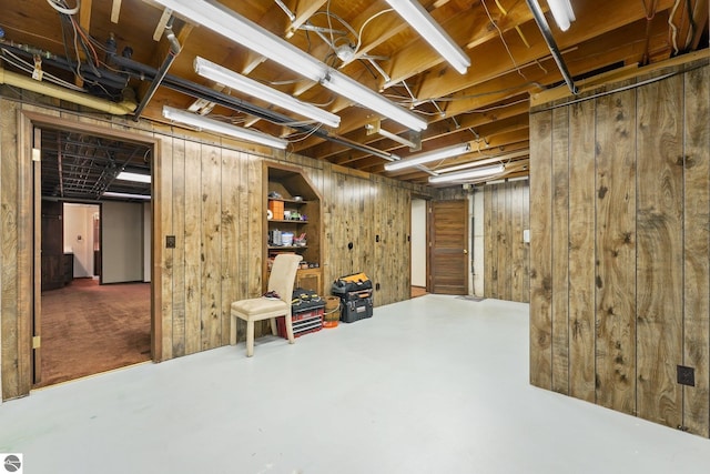 800 Evart St, Cadillac, MI 49601 - unfinished basement featuring wood walls