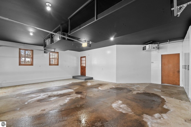 800 Evart St, Cadillac, MI 49601 - garage featuring a garage door opener