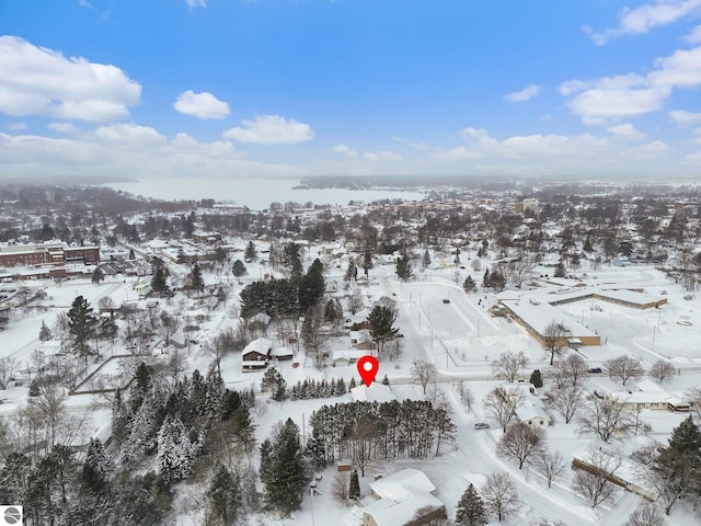 800 Evart St, Cadillac, MI 49601 - snowy aerial view featuring a water view