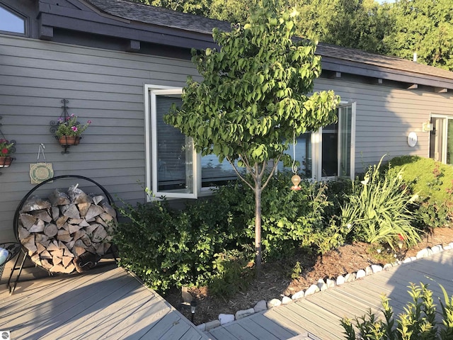 1137 Crystal Dr, Frankfort, MI 49635 - exterior space with a shingled roof and a deck
