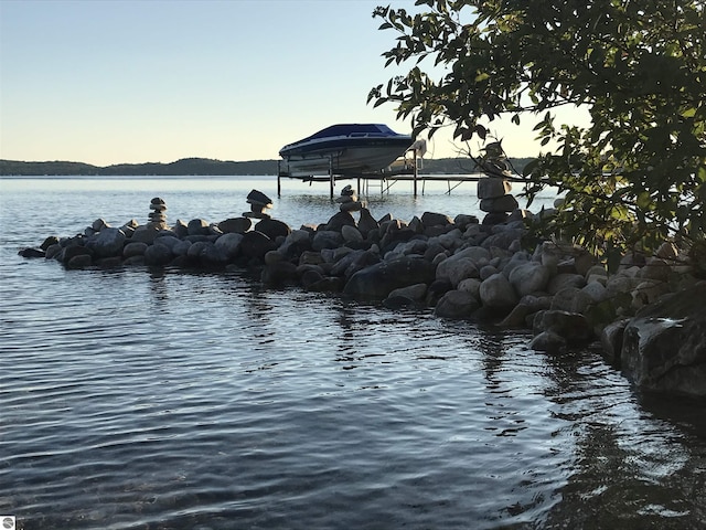 1137 Crystal Dr, Frankfort, MI 49635 - property view of water featuring boat lift