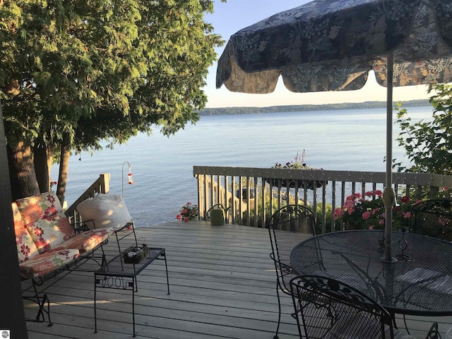 1137 Crystal Dr, Frankfort, MI 49635 - deck featuring a water view