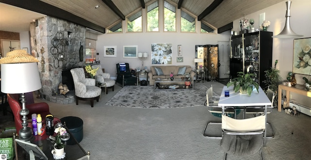 1137 Crystal Dr, Frankfort, MI 49635 - carpeted living area with beamed ceiling, high vaulted ceiling, and wooden ceiling