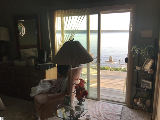 1137 Crystal Dr, Frankfort, MI 49635 - interior space featuring plenty of natural light and a water view