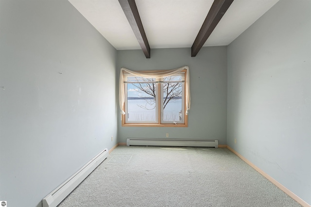 1137 Crystal Dr, Frankfort, MI 49635 - unfurnished room featuring a baseboard heating unit, light carpet, beam ceiling, baseboards, and baseboard heating