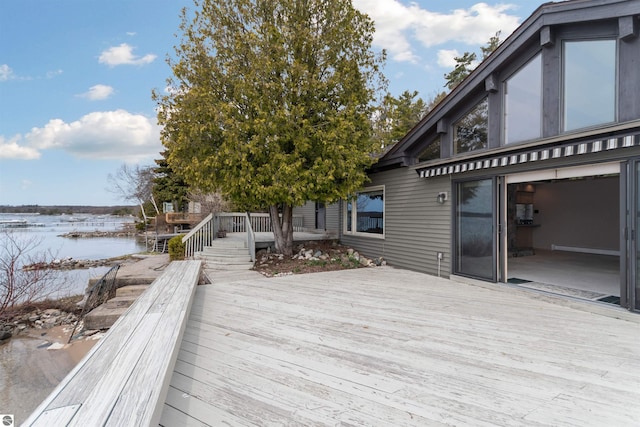 1137 Crystal Dr, Frankfort, MI 49635 - wooden deck with a water view