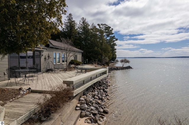 1137 Crystal Dr, Frankfort, MI 49635 - dock area featuring a deck with water view