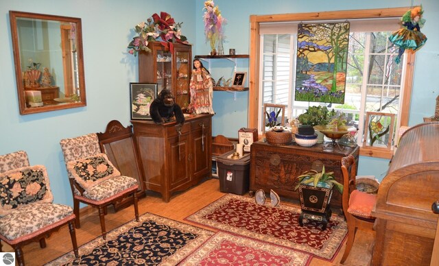 102 James Sq, Roscommon, MI 48653 - sitting room featuring light wood-style flooring