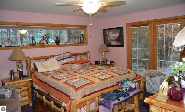 102 James Sq, Roscommon, MI 48653 - bedroom featuring access to outside