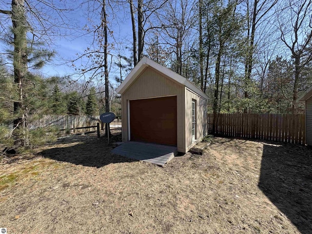 garage featuring fence