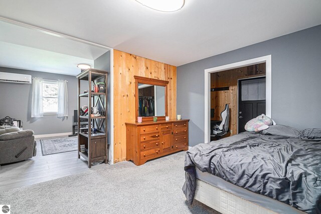 9809 Wilson Rd, Buckley, MI 49620 - bedroom with baseboards and a wall unit AC