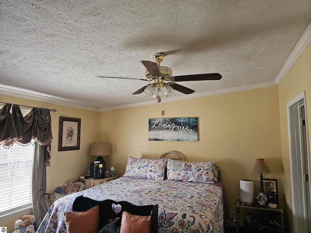 bedroom with a textured ceiling, ornamental molding, and ceiling fan