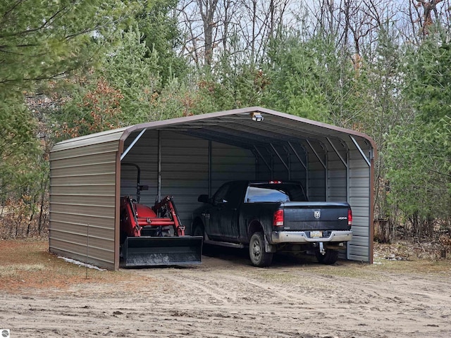 view of parking / parking lot featuring a detached carport