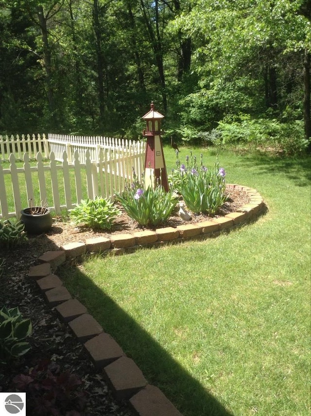 view of yard featuring fence