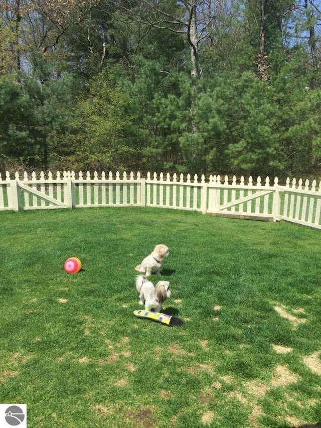 view of yard with fence