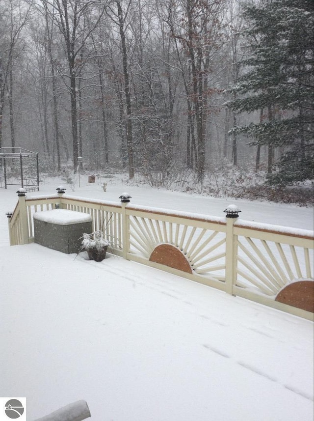 view of snow covered deck