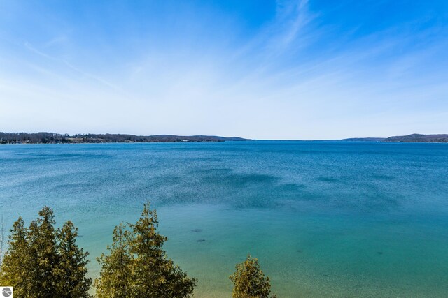 112 N Benzie Blvd, Beulah, MI 49617 - property view of water with a mountain view