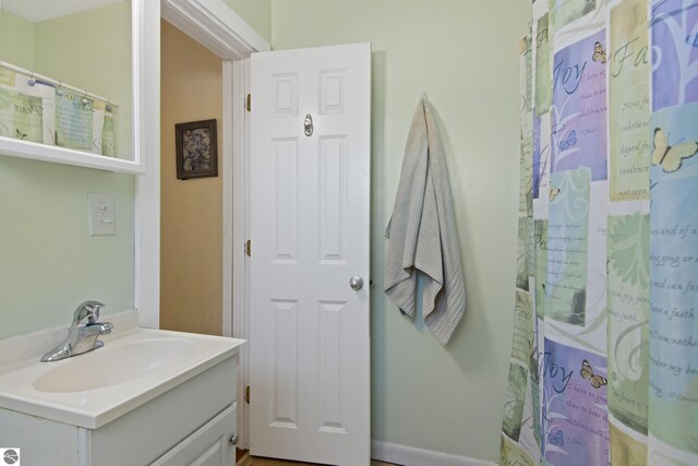 112 N Benzie Blvd, Beulah, MI 49617 - bathroom with vanity