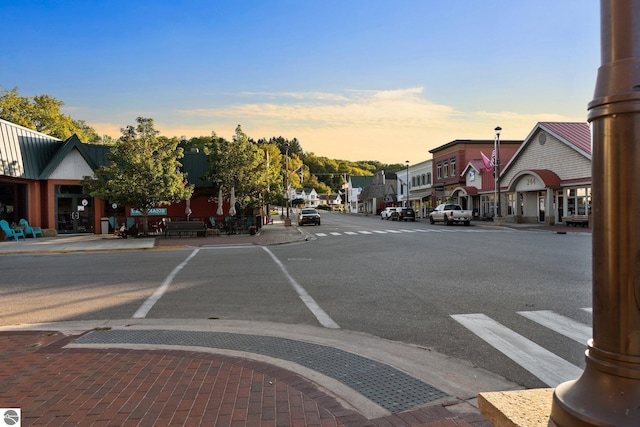 112 N Benzie Blvd, Beulah, MI 49617 - view of road with curbs, street lighting, sidewalks, and a residential view
