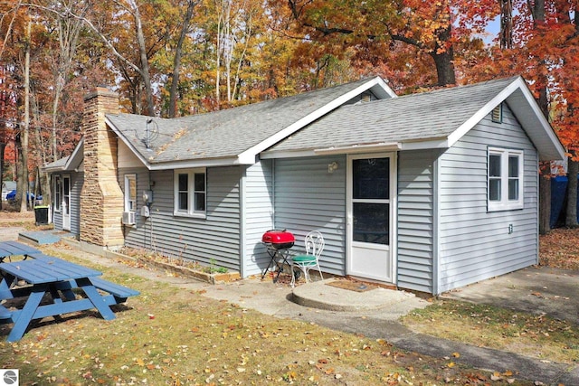 view of front of property featuring a chimney