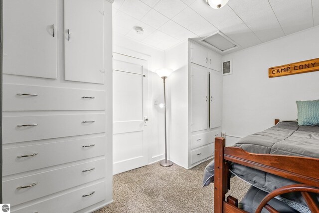 bedroom with attic access
