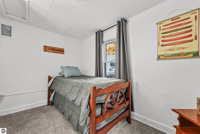 bedroom featuring attic access, carpet floors, baseboards, and visible vents