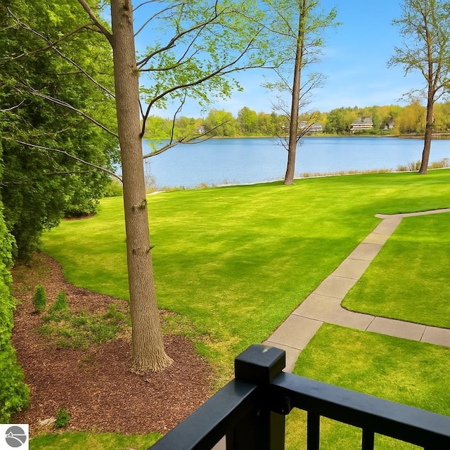 750 Centre Pl Unit 2, Traverse City, MI 49686 - view of green lawn with a water view
