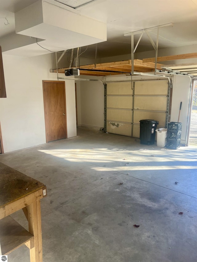 garage featuring a garage door opener