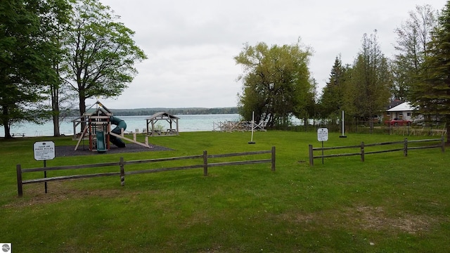 12110 Jonathan Dr, Rapid City, MI 49676 - view of yard with a water view
