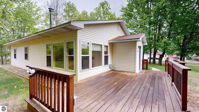 12110 Jonathan Dr, Rapid City, MI 49676 - view of wooden deck