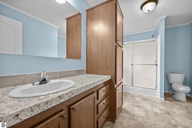 bathroom featuring a shower stall, vanity, ornamental molding, toilet, and baseboards