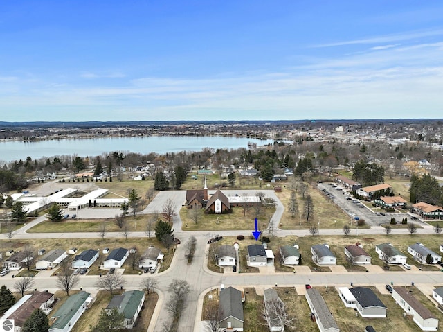 aerial view featuring a residential view and a water view