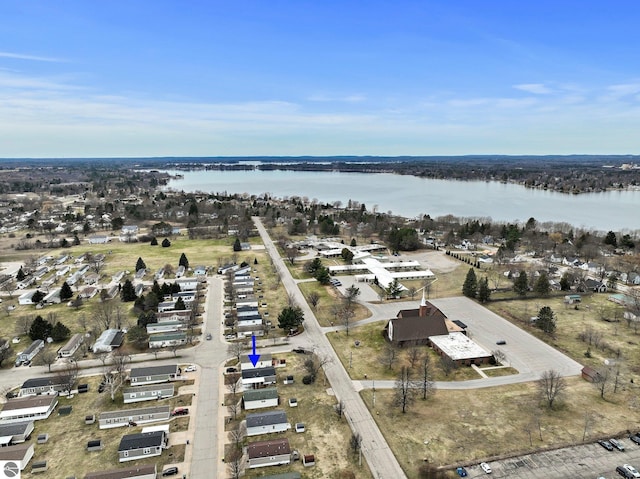 drone / aerial view with a water view