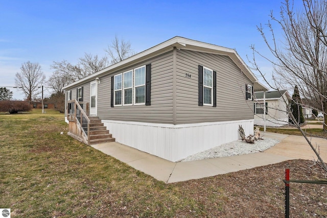 view of home's exterior featuring a yard