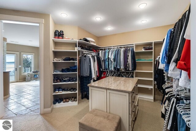 6579 Woods Creek Dr, Charlevoix, MI 49720 - walk in closet with light carpet