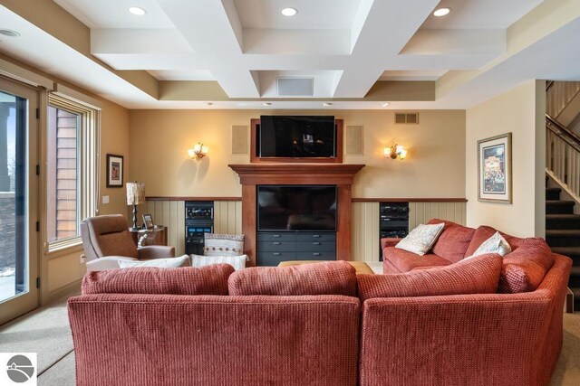 6579 Woods Creek Dr, Charlevoix, MI 49720 - carpeted living area featuring visible vents, recessed lighting, coffered ceiling, and stairs