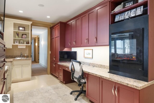 6579 Woods Creek Dr, Charlevoix, MI 49720 - office space featuring a sink, built in study area, and recessed lighting