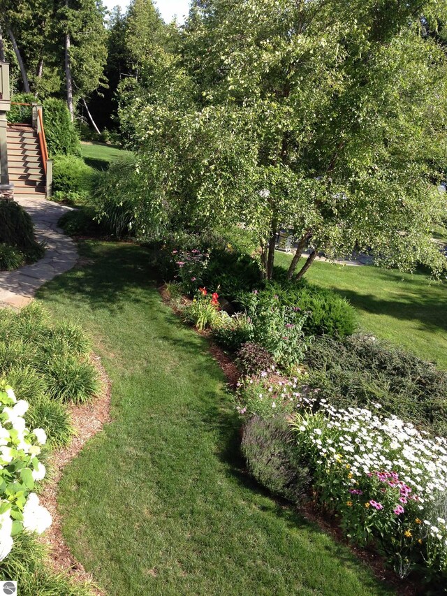 6579 Woods Creek Dr, Charlevoix, MI 49720 - view of yard featuring stairs