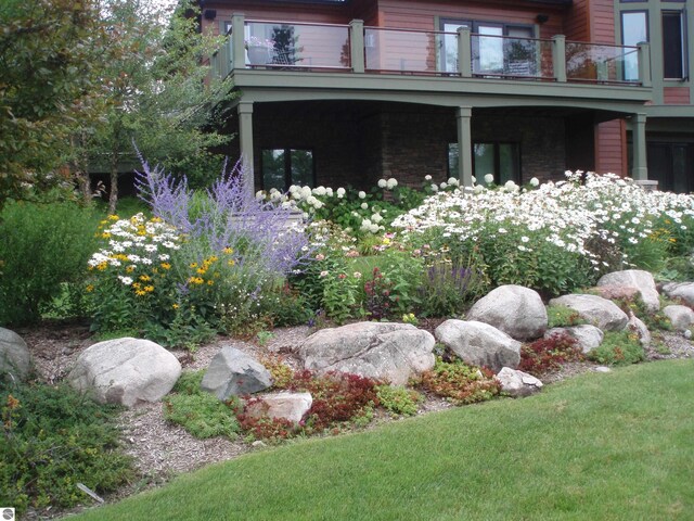 6579 Woods Creek Dr, Charlevoix, MI 49720 - exterior space with a balcony