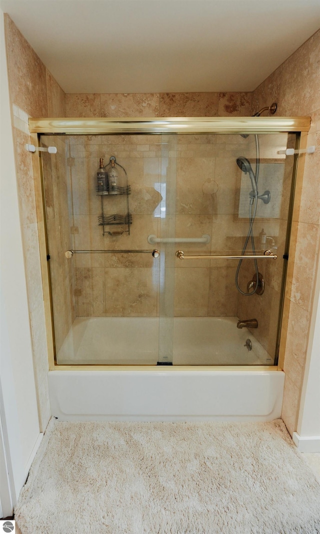 bathroom featuring enclosed tub / shower combo
