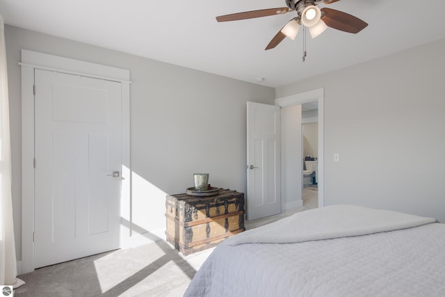 bedroom with light colored carpet and ceiling fan